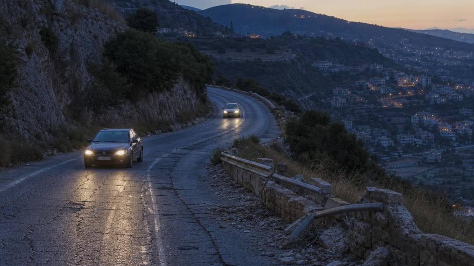 Editorial illustration of a mountain road in Lebanon; not a photograph of a specific crash site.